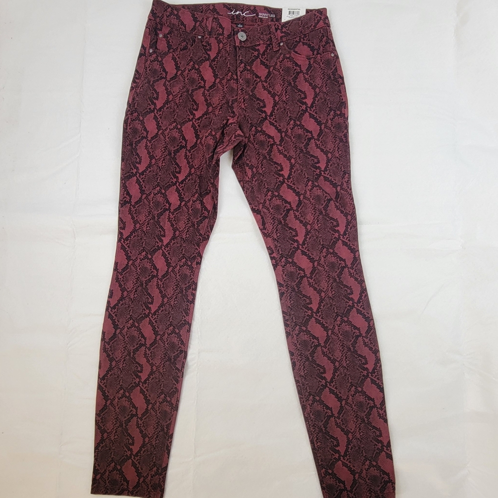 INC International Concepts Pink and Black Skinny Jeans with Snakeskin Pattern